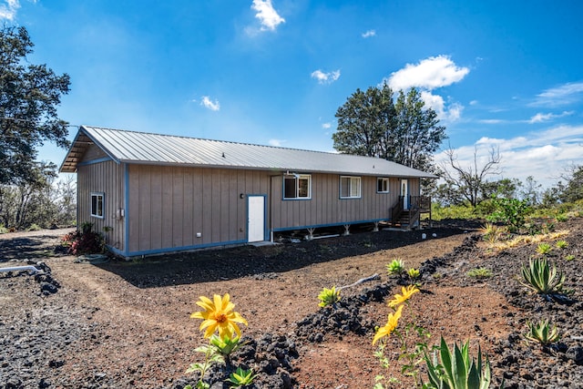 92-8227 Trade Wind Blvd, Ocean View, HI 96737 - rear view of property with metal roof
