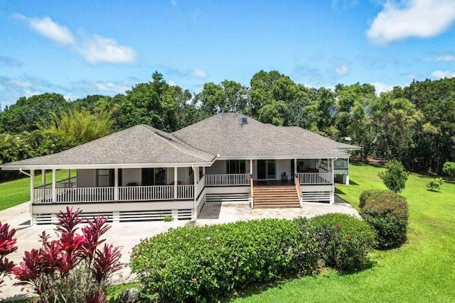 5750-M Olohena Rd, Kapaa, HI 96746 - back of property featuring covered porch, a yard, and a shingled roof