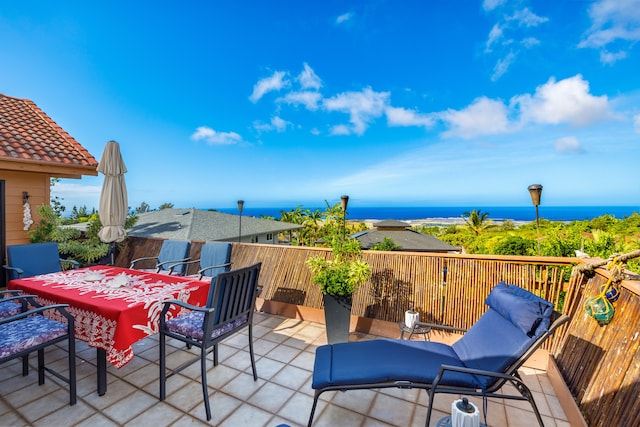 73-1291 Kaiminani Dr, Kailua-Kona, HI 96740 - view of patio featuring a water view and outdoor dining space