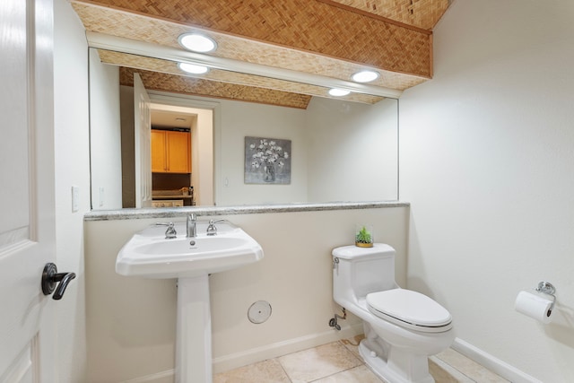 68-1125 Kaniku Dr Unit 1103, Kamuela, HI 96743 - bathroom with baseboards, toilet, tile patterned floors, and a sink