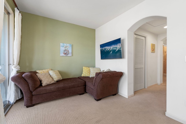 68-1125 Kaniku Dr Unit 1103, Kamuela, HI 96743 - carpeted living area with baseboards and arched walkways