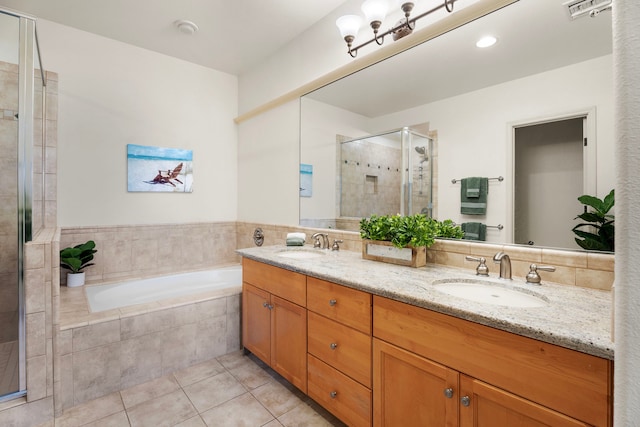 68-1125 Kaniku Dr Unit 1103, Kamuela, HI 96743 - full bath with tile patterned floors, double vanity, a bath, and a shower stall