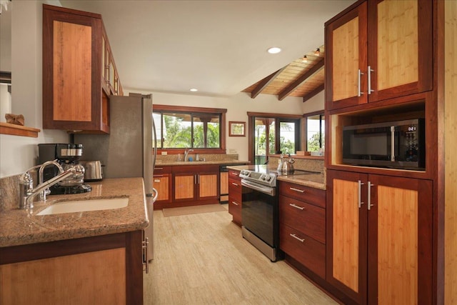 82-6289 Kahauloa St, Captain Cook, HI 96704 - kitchen with stainless steel range with electric cooktop, a sink, light stone countertops, recessed lighting, and light wood-style flooring