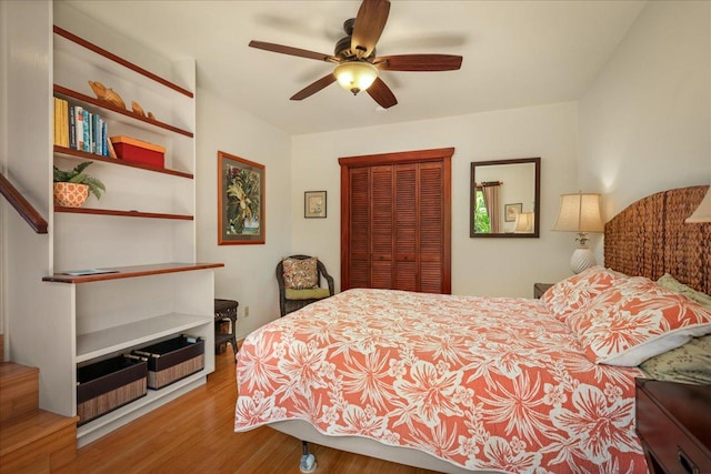 82-6289 Kahauloa St, Captain Cook, HI 96704 - bedroom featuring a closet, wood finished floors, and a ceiling fan