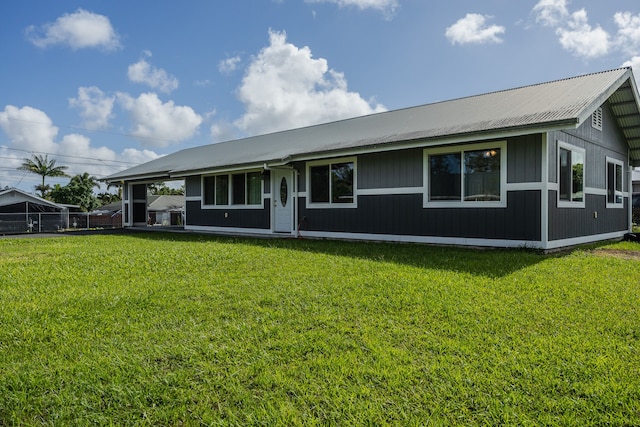 16-2042 Sandalwood Dr, Pahoa, HI 96778 - view of front of house featuring metal roof and a front lawn