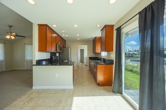 16-2042 Sandalwood Dr, Pahoa, HI 96778 - kitchen with stainless steel appliances, a sink, dark countertops, healthy amount of natural light, and recessed lighting