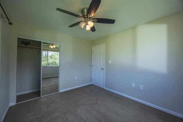 16-2042 Sandalwood Dr, Pahoa, HI 96778 - unfurnished bedroom featuring carpet flooring, baseboards, a ceiling fan, and a closet