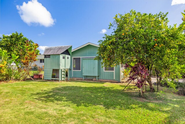 384-A Kaholalele Rd Unit B, Kapaa, HI 96746 - view of front of property featuring a front lawn and an outdoor structure