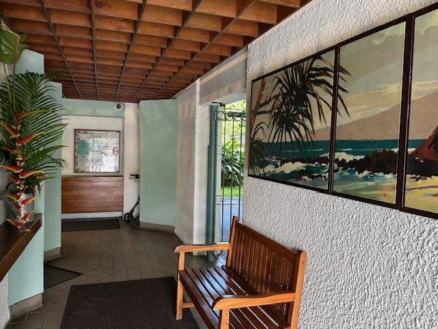 1875 Kalanianaole St Unit 209, Hilo, HI 96720 - hall with tile patterned floors and baseboards