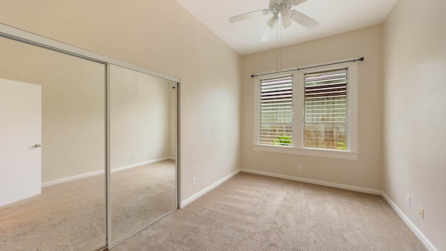 4460 Punee Rd Unit A, Koloa, HI 96756 - unfurnished bedroom with light colored carpet, a closet, baseboards, and a ceiling fan