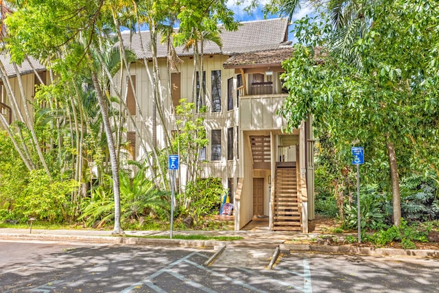 2721 Poipu Rd Unit 100, Koloa, HI 96756 - view of property featuring stairway