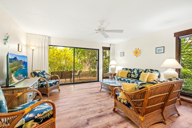 2721 Poipu Rd Unit 100, Koloa, HI 96756 - living room featuring wood finished floors and ceiling fan