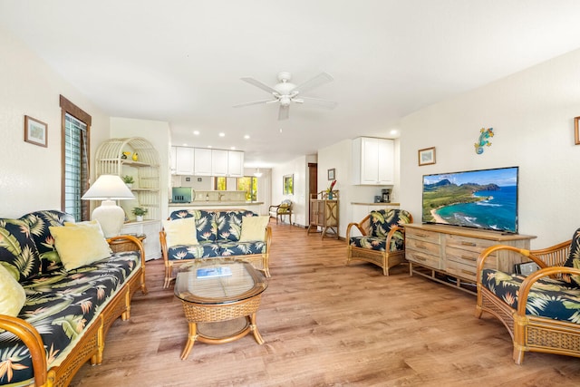2721 Poipu Rd Unit 100, Koloa, HI 96756 - living room with light wood finished floors and a ceiling fan