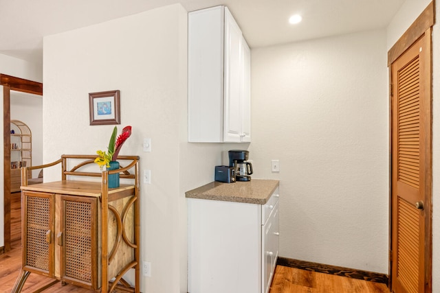2721 Poipu Rd Unit 100, Koloa, HI 96756 - corridor featuring wood finished floors and recessed lighting