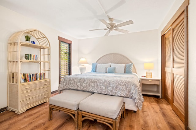 2721 Poipu Rd Unit 100, Koloa, HI 96756 - bedroom featuring a closet, light wood finished floors, and ceiling fan