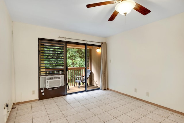 3411 Wilcox Rd Unit Ev62, Lihue, HI 96766 - empty room with cooling unit, ceiling fan, light tile patterned floors, and baseboards