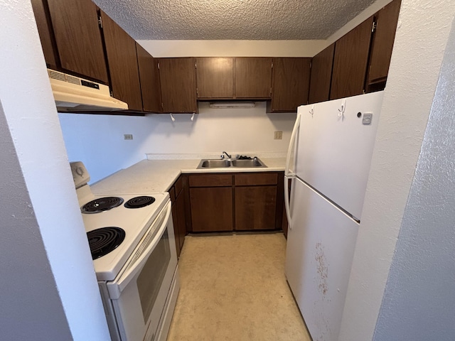 33 Hualalai St Unit 203, Hilo, HI 96720 - kitchen featuring white appliances, a sink, under cabinet range hood, a textured ceiling, and light countertops