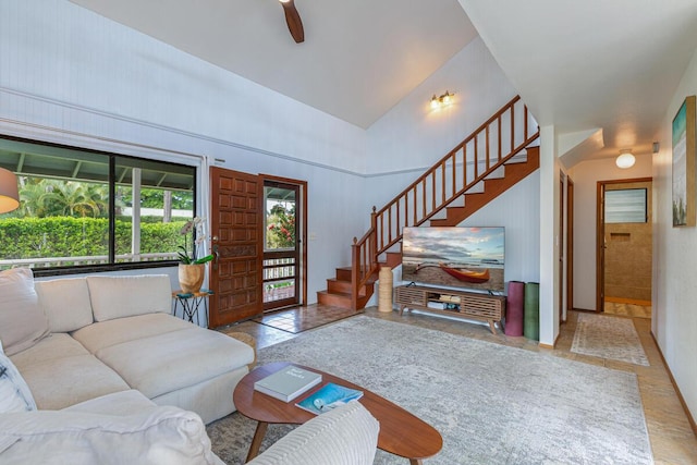 4465 Aku Rd, Hanalei, HI 96722 - living area with stairs, a ceiling fan, and high vaulted ceiling