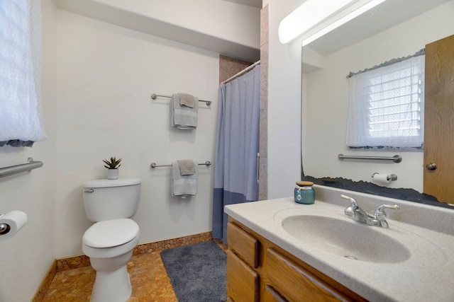 3719 Uwao St, Hanapepe, HI 96716 - full bathroom featuring toilet, vanity, baseboards, and curtained shower