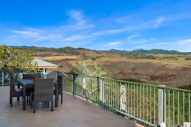 3719 Uwao St, Hanapepe, HI 96716 - view of patio / terrace with a mountain view and outdoor dining area