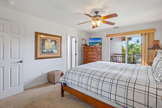 69-555 Waikoloa Beach Dr Unit 2605, Waikoloa, HI 96738 - carpeted bedroom featuring access to exterior, ceiling fan, and baseboards