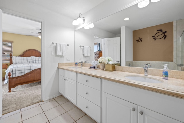 69-555 Waikoloa Beach Dr Unit 2605, Waikoloa, HI 96738 - ensuite bathroom with double vanity, tile patterned flooring, and ceiling fan