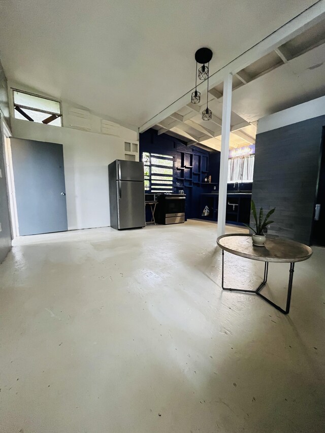 12-4298 Lanai St, Pahoa, HI 96778 - living room featuring concrete floors and vaulted ceiling