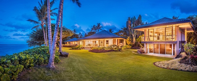 3670 Anini Rd, Kilauea, HI 96754 - back of house featuring a yard and a balcony