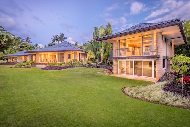 3670 Anini Rd, Kilauea, HI 96754 - rear view of house featuring a yard