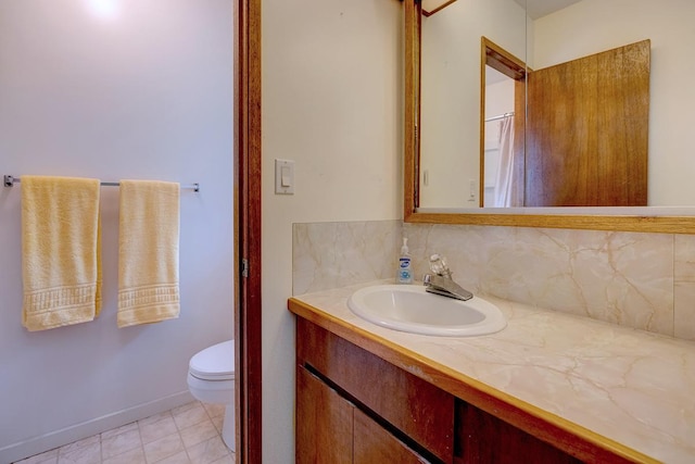 17-549 Ipuaiwaha St, Keaau, HI 96749 - bathroom with backsplash, vanity, toilet, and tile patterned floors
