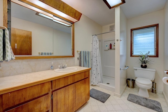 17-549 Ipuaiwaha St, Keaau, HI 96749 - full bathroom featuring vanity, toilet, a stall shower, and tasteful backsplash
