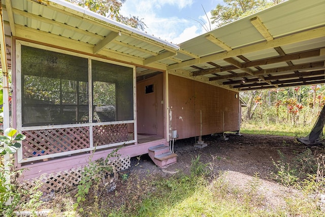 17-549 Ipuaiwaha St, Keaau, HI 96749 - view of patio / terrace featuring a carport