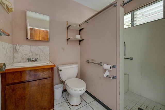 17-549 Ipuaiwaha St, Keaau, HI 96749 - bathroom with tile patterned floors, toilet, vanity, and a shower