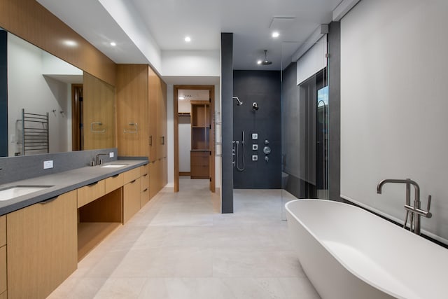 68-1049 Ke Kailani Dr, Kamuela, HI 96743 - bathroom featuring a stall shower, a freestanding tub, radiator heating unit, double vanity, and tile patterned flooring