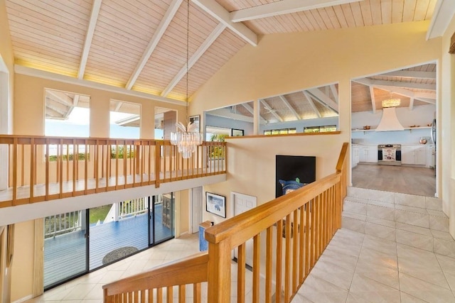 77-172 Kekai Pl, Kailua-Kona, HI 96740 - stairway with a chandelier, tile patterned floors, high vaulted ceiling, and wooden ceiling with exposed beams