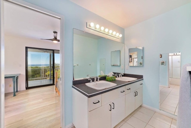77-172 Kekai Pl, Kailua-Kona, HI 96740 - bathroom with double vanity, a ceiling fan, tile patterned flooring, and baseboards