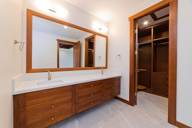 73-4460 Kohanaiki Rd, Kailua-Kona, HI 96740 - bathroom with double vanity, baseboards, and toilet