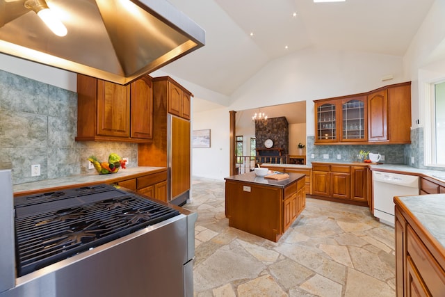 73-4310 Huehue St, Kailua-Kona, HI 96740 - kitchen with white dishwasher, gas stove, high end fridge, brown cabinets, and high vaulted ceiling