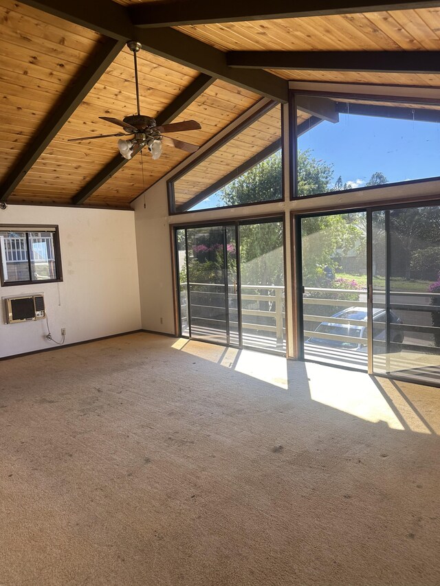 68-1809 Hooko St, Waikoloa, HI 96738 - unfurnished living room with wood ceiling, plenty of natural light, carpet floors, ceiling fan, and an AC wall unit