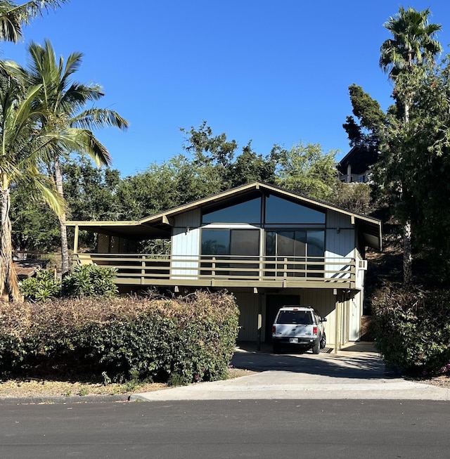 68-1809 Hooko St, Waikoloa, HI 96738 - view of front of home featuring driveway and a carport