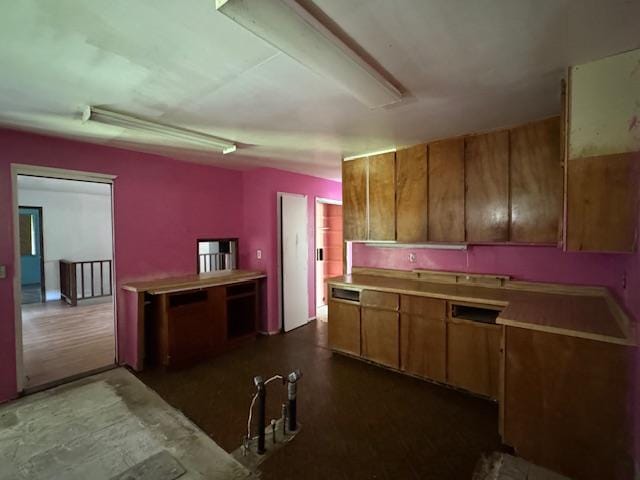 15-2038 14th Ave, Keaau, HI 96749 - kitchen with brown cabinetry and light countertops