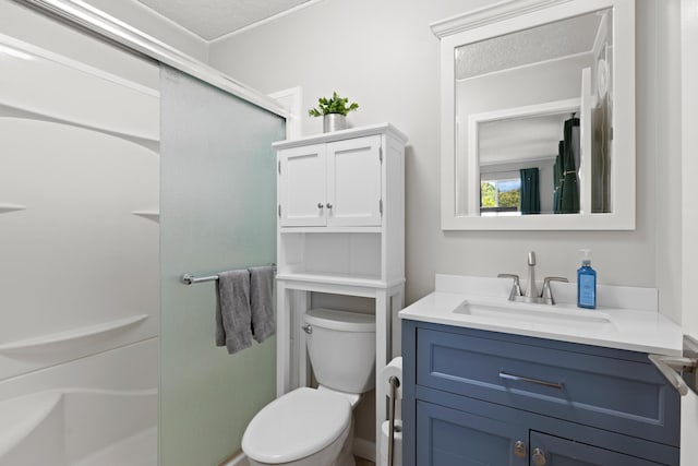 1646 Oneawa Pl, Hilo, HI 96720 - bathroom featuring a shower with door, vanity, and toilet
