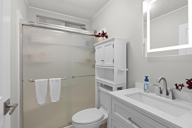 1646 Oneawa Pl, Hilo, HI 96720 - full bathroom with a textured ceiling, a stall shower, vanity, toilet, and crown molding