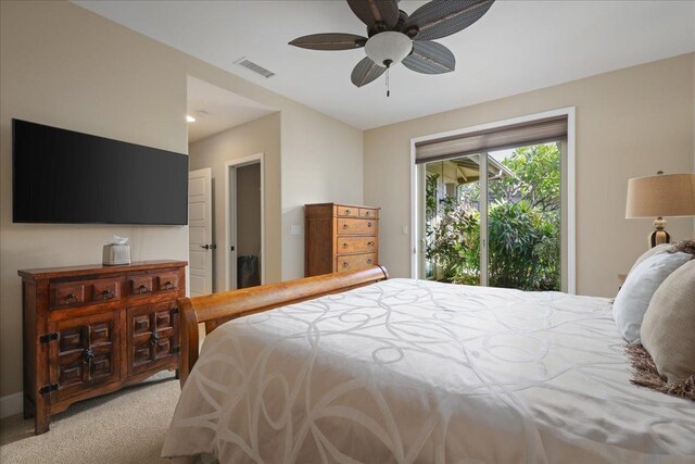 68-1122 Kaniku Dr Unit 111, Kamuela, HI 96743 - bedroom featuring light colored carpet, access to exterior, and ceiling fan
