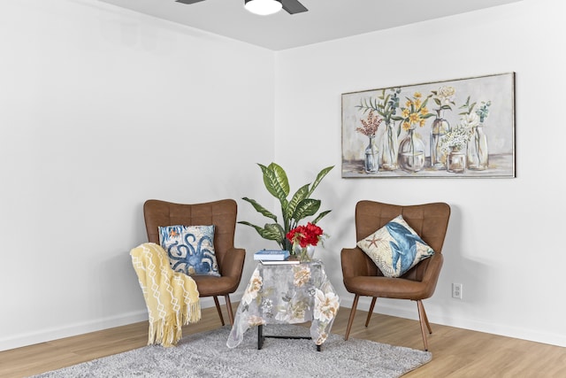 15-385 Puni Makai Loop, Pahoa, HI 96778 - sitting room with wood finished floors, ceiling fan, and baseboards
