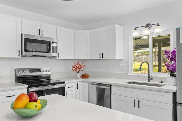 15-385 Puni Makai Loop, Pahoa, HI 96778 - kitchen featuring appliances with stainless steel finishes, a sink, and light countertops