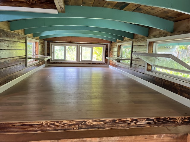 12-7010 Nahokulele St, Pahoa, HI 96778 - hallway with hardwood / wood-style flooring, wood ceiling, wooden walls, baseboards, and plenty of natural light