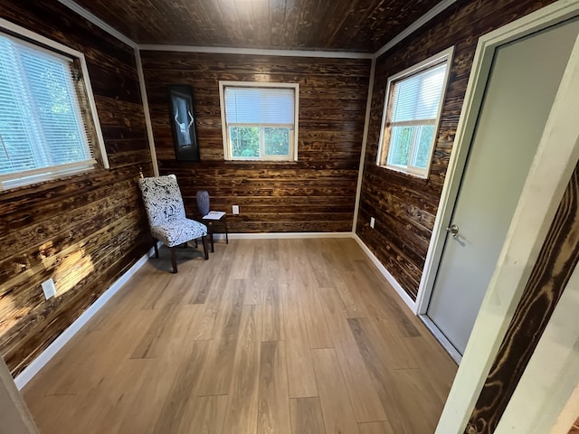 12-7010 Nahokulele St, Pahoa, HI 96778 - unfurnished room featuring wood walls, plenty of natural light, wood finished floors, wooden ceiling, and baseboards