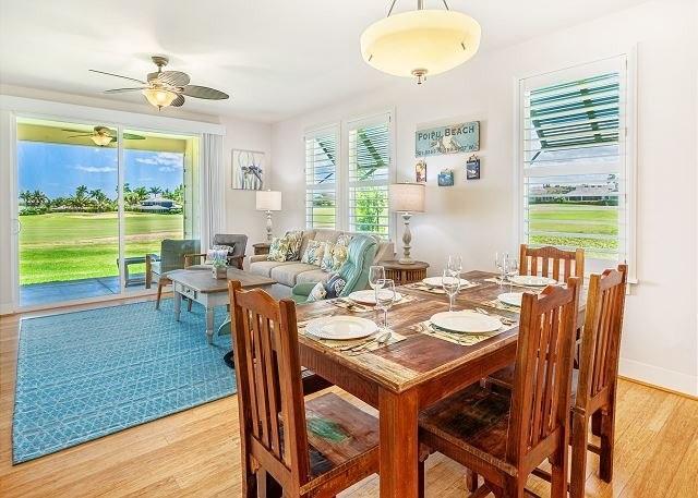 2611 Kiahuna Plantation Dr Unit 8J, Koloa, HI 96756 - dining space with light wood finished floors, ceiling fan, and baseboards