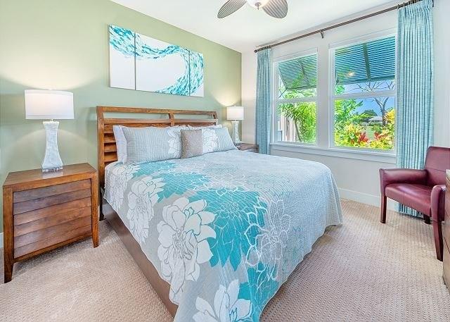 2611 Kiahuna Plantation Dr Unit 8J, Koloa, HI 96756 - carpeted bedroom with baseboards and ceiling fan
